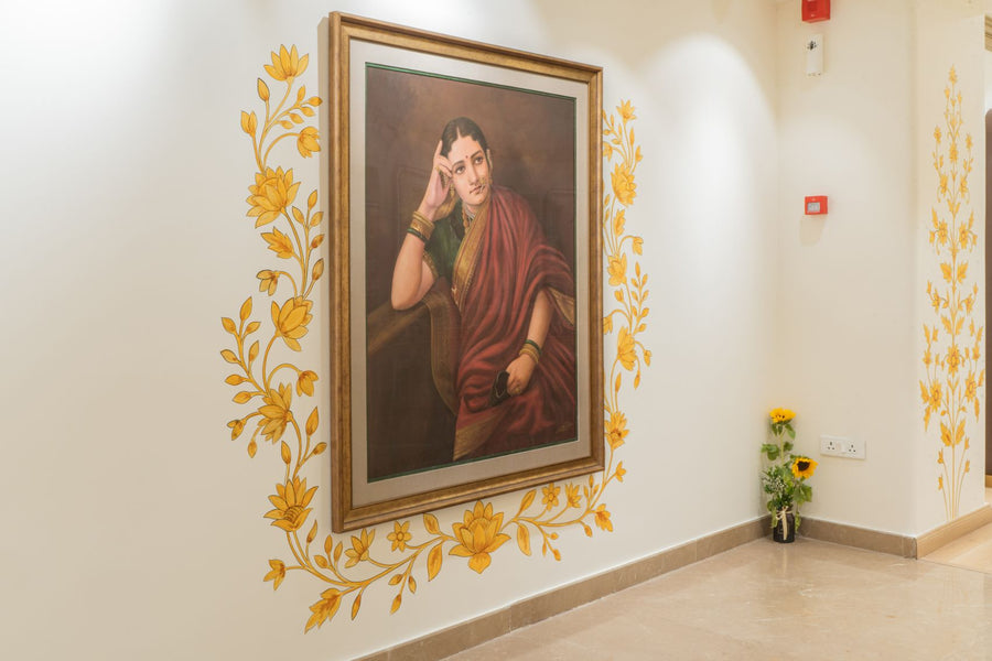 A painting on a wall of golden flowers